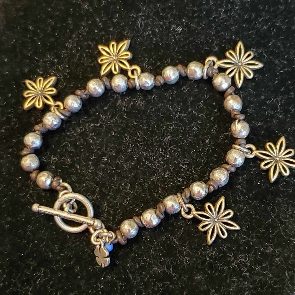 Lucky Brand silvertone hammered bead with star charms bracelet